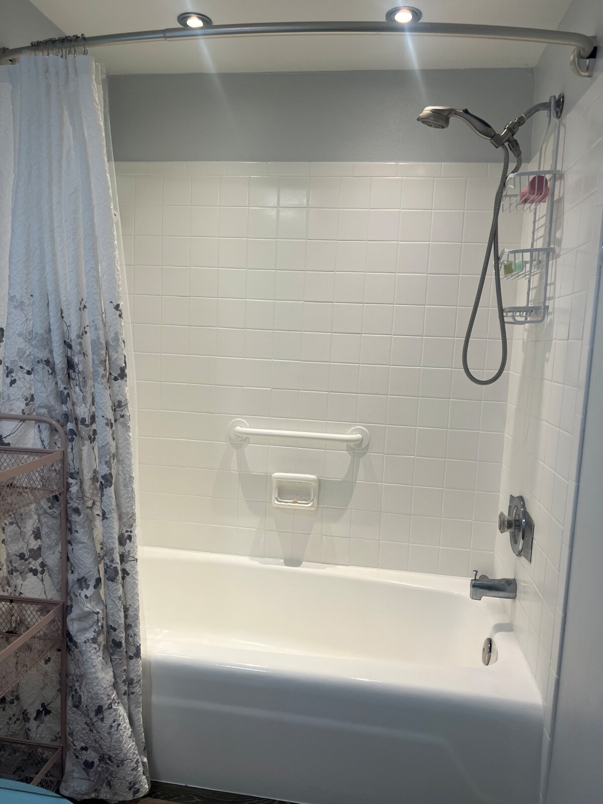 Full bathroom with tub and shower
